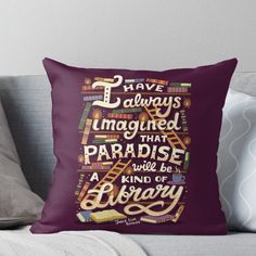 a purple pillow with the words i have always imagine that paradise will be a kind of library