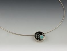 Orbit Necklace Modern Turquoise Sterling Silver Jewelry, Modern Turquoise Round Jewelry, Modern Round Turquoise Jewelry, Modern Oxidized Jewelry With Round Pendant, Modern Oxidized Round Pendant Jewelry, Modern Oxidized Finish Round Pendant Jewelry, Texas Crafts, Turquoise Resin, Sculptural Object