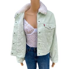 Brand: Levi’s Model: Baby Cropped Trucker Jacket Style #: A34890001 Size: Womens Xs (Oversized Fit) Size: Womens S (Oversized Fit) Size: Womens M (Oversized Fit) Color: Mint Green Material: 100% Cotton Corduroy Exterior W/ Polyester Sherpa Collar & Polyester Lining Size Xs Measurements: Chest: 21" (Underarm Seam To Underarm Seam) Total Length: 21.5" (Base Of Jacket To Top Of Back Collar) Sleeves: 22” (Cuff Of Sleeve To Shoulder Seam) Shoulders: 20” (Shoulder Seam To Shoulder Seam) Size S Measurements: Chest: 22" (Underarm Seam To Underarm Seam) Total Length: 22" (Base Of Jacket To Top Of Back Collar) Sleeves: 22” (Cuff Of Sleeve To Shoulder Seam) Shoulders: 20” (Shoulder S Green Cropped Jacket With Pockets, Green Sherpa Jacket, Green Button-up Cotton Denim Jacket, Green Long Sleeve Patchwork Windbreaker, Levis Sherpa Jacket, Military Green Utility Jacket With Button Closure, Levis Jacket, Sherpa Jacket, Jacket Brands