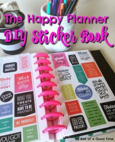 the happy planner diy sticker book is open on a table with pens and pencils