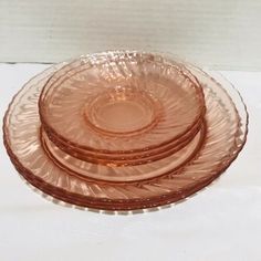 three glass plates stacked on top of each other