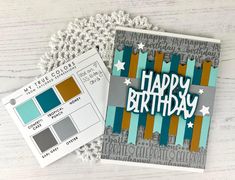 a happy birthday card next to a crocheted doily