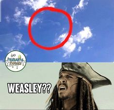 a man with dreadlocks is looking up at a red circle in the sky