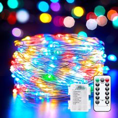 multicolored lights and remote control on table