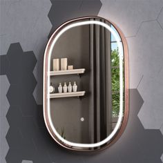 a bathroom mirror with shelves and vases on it