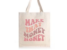 This canvas tote bag is perfect for someone who is ready to manifest money, wealth, and abundance this year! Featuring a vibrant, retro-style font that reads 'Make That Money Honey', this tote bag is sure to make a statement. Crafted from durable canvas fabric, this bag is designed to last. It also features a spacious interior, perfect for carrying your essentials. Whether you're heading to the office, to the market, or to the coffee shop, this tote bag is your perfect companion. Make that money Eco-friendly Letter Print Shoulder Bag Gift, Tote Bag Graphic Design, Money Honey, Wealth And Abundance, Money Wealth, Money Manifestation, Retro Bags, Graphic Tote, Manifest Money