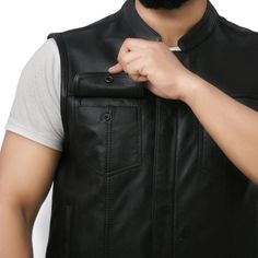 When it comes to the modern yet traditional look, the leather vest is the one to complete it for you. Best Leather NY offers you the best plunge men's motorcycle leather vest to make you fulfil your dream of looking rugged yet professional and cool. It is a cowhide leather jacket with pockets and a two-button chest. When you want to make your hiking trip worthwhile and safe, this vest is one of the best to complement your outfit. It can be worn around the city, hiked, or used as a mid-layer for Leather Biker Vest For Winter, Fall Leather Moto Vest, Winter Leather Vest For Biker Events, Black Leather Moto Vest, Leather Vest For Motorcycling In Fall, Leather Vest For Motorcycling, Fall Season, Sleeveless Leather Outerwear For Biker Events, Black Leather Motorcycle Vest, Black Leather Vest For Motorcycling