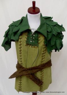 a mannequin is dressed in green and brown