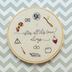 an embroidered hoop with some writing on it