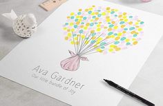 a greeting card with a bouquet of balloons on it and a measuring tape next to it