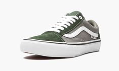 The Vans Old Skool Pro is an authentic skateboarding shoe that's also great for lifestyle wear.  The low-profile sneaker features a sturdy suede and canvas upper—forest green on the suede and grey on the canvas.  Bright white contrasting appears on the Vans Sidestripe, top eyelet, laces, and stitching.  The vulcanized midsole also contrasts in white.  Underneath is a rubber waffle outsole with excellent traction that grips the streets or the board.  The ‘Pro’ version of the Old Skool is designed Urban Canvas Shoes For Skateboarding, Green Vulcanized Sole Skate Shoes, Vans Low-top Canvas Shoes For Skateboarding, Green Vans Skate Shoes For Skateboarding, Urban Vans Canvas Shoes For Skateboarding, Canvas Urban Skate Shoes For Streetwear, Urban Canvas Skate Shoes For Streetwear, Urban Vans Canvas Skate Shoes, Urban Canvas Sneakers For Skateboarding