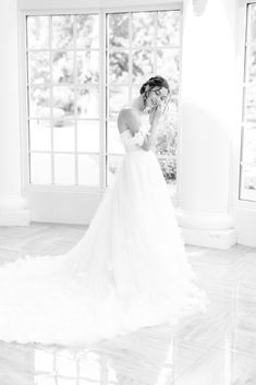 bride prepares for wedding day in the atrium of the Belk Chapel | Charlotte wedding day at Belk Chapel and the Palmer Building with North Carolina wedding photographer Kevyn Dixon Photography. Wedding Preparation