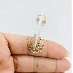 ❤️ 10k Gold Earrings basket Girl / women's   ❤️Small Earrings hoop yellow gold with white cubic zirconia  ❤️ 15mm long  ❤️ Lightweight confortable on ear ❤️ New Jewelry  ❤️ Aretes de Oro de Niña o mujer en oro 10 Kilates  ❤️ Arracadas de canasta pequeñas - Oro dorado con zirconia blanca   ❤️ 15 milímetros    SKU 51126 Pierced Yellow Gold Cubic Zirconia Huggie Earrings, Gold Small Hoop Diamond Earrings With Accents, Gold Small Hoop Diamond Earrings With Diamond Accents, Gold Hoop Diamond Earrings With Accents, Gold Diamond Earrings With Filigree Detail, Gold Tarnish-resistant Round Diamond Earrings, Gold Huggie Diamond Earrings, Pierced, Small Hoop Gold Diamond Earrings, Gold Hoop Earrings With Diamond Accents