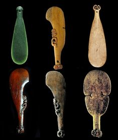 four different types of carved wooden objects on black background, including one with an eye and the other without eyes