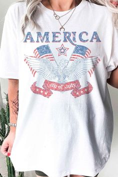 AMERICA OVERSIZED GRAPHIC TEE / T-SHIRTPREMIUM COTTONOVERSIZED FIT Patriotic Crew Neck T-shirt For Spring, Trendy Cotton T-shirt For Independence Day, Spring Crew Neck T-shirt With American Flag Print, Casual Letter Print T-shirt For Independence Day, Trendy American Flag Print T-shirt For Spring, Trendy Graphic Print T-shirt For 4th Of July, Casual Pre-shrunk Independence Day T-shirt, Casual Pre-shrunk T-shirt For Independence Day, Casual Independence Day Pre-shrunk T-shirt