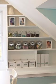 the shelves in this room are filled with books and other things to use for storage