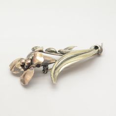 925 Sterling Silver / 1/20 12K G.F. Vintage Carl Art Floral Pin Brooch 925/ 1/20 12K Weight: 10.6g WELCOME TO PAWN SHOP We are an actual pawn shop and have been in business for over 25 years. Since 1990, our establishment has been serving a variety of clients by providing them with short term cash solutions and options of liquidity regarding their treasured heirlooms. Acknowledging that today′s customers are very sophisticated and are looking for a variety of investments, our acquisitions are ha Antique Gold Sterling Silver Brooch, Antique Gold Sterling Silver Brooches, Kyanite Ring, Floral Pins, Pawn Shop, Onyx Ring, Pinky Ring, Pin Brooch, Adjustable Rings