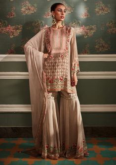 Kalista-Akilah Beige Gharara Set-INDIASPOPUP.COM Sharara Set, Embroidered Neckline, Kurta With Pants, Embroidered Tunic, Contemporary Outfits, Kurta Set, Print Tunic, Print Jacket, Pant Set