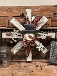 a snowman decoration on top of a wooden crate