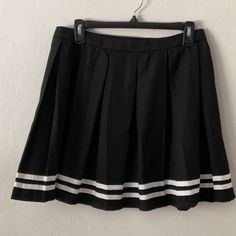 New With Tags Black With White Pleated Skirt Size Large Waist Is Approximately 15” Length Is Approximately 17” Has Size Zipper With Button & Hook Closure Cheerleader Skirt, Girls In Suspenders, Black Pleated Mini Skirt, Diagonal Stripes Pattern, Black Velvet Skirt, White Pleated Skirt, Mini Skater Skirt, Velvet Mini Skirt, Black Pleated Skirt