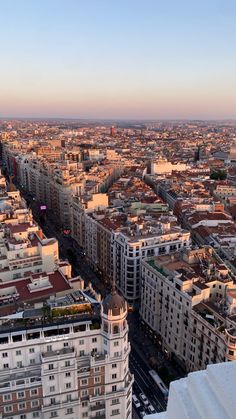 an aerial view of the city with tall buildings