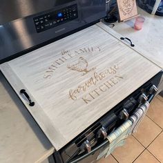 a wooden sign that says season everything with love on it in front of an oven