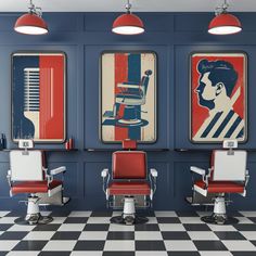 two red and white chairs sitting next to each other in front of posters on the wall