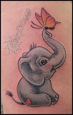 an elephant with a butterfly on its back