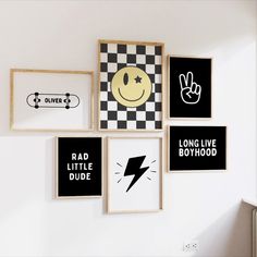 four framed pictures on the wall with different sayings and symbols in black and white