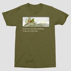 Style casually and stay comfy with the Men's Frog and Toad Short Sleeve Graphic T-Shirt in Moss Green. Made from a midweight blend of cotton and polyester, this short-sleeve tee has a classic crewneck for keeping you relaxed. The standard fit ensures ease of movement, making it a cool addition to your daily wardrobe. Frog And Toad Shirt, Frog And Toad Outfit, Nature Clothes, Funny Clothing, Cozy Clothes, Oc Board, Sweater Short Sleeve, Dream Summer, Fall Mood