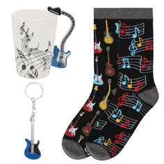 two pairs of socks with musical notes on them and a guitar shaped keychain