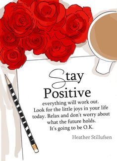 a cup of coffee and some red roses on a white sheet with the words stay positive