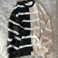 Oversized Xs Oversized Striped Color Block Sweater, Oversized Winter Sweater With Contrast Stripes, Oversized Winter Tops With Contrast Stripes, Winter Oversized Tops With Contrast Stripes, Striped Relaxed Fit Sweatshirt For Winter, Winter Striped Relaxed Fit Sweatshirt, Oversized Striped Sweatshirt For Fall, Trendy Striped Sweater For Streetwear, Casual Winter Sweater With Vertical Stripes