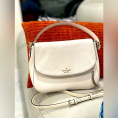 Kate Spade New York Jackson White Soft Pebbled Leather Medium Flap Shoulder Bag 11″ L X 9″ H X 3.5″ W Longer Strap Unused New Used Good Condition Tag Not Attached Kate Spade New York Jackson Medium Flap Shoulder Bag Is Chic And Functional. Holds All Your Essentials And More. Beautiful Soft Pebbled Leather With Lots Of Compartments. Kate Spade New York Jackson Medium Flap Shoulder Bag In Pebbled Leather With Silver Tone Hardware Fold-Over Flap With Magnetic Closure; Zip Pocket On Flap; Removable, Kate Spade Cream Bag With Detachable Handle, Kate Spade Cream Crossbody Shoulder Bag, Kate Spade Cream Bag With Adjustable Strap, White Kate Spade Bag With Detachable Strap, White Kate Spade Bag With Adjustable Strap, Kate Spade White Bag With Top Carry Handle, Kate Spade White Satchel For Travel, Kate Spade Cream Bag For Errands, Kate Spade Beige Crossbody Satchel