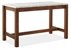 a wooden table with a white marble top and two legs on the bottom, against a white background