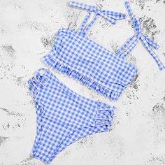 Embrace Timeless Charm with the Gingham Two-Piece Bikini Dive into vintage charm and modern confidence with the Gingham Two-Piece Bikini. This enchanting set captures the essence of classic style with a playful twist. High-waisted plaid bikini bottom: Flatter your curves and exude a touch of retro flair with the high-waisted design, featuring the timeless elegance of a gingham print. Stunning cut-out strappy details: Elevate your poolside look with unique and eye-catching cut-outs and delicate s Black Mermaid Dress, Plus Size Summer Fashion, Plaid Bikinis, Bandage Swimsuit, Couple Style, White Shoes Women, Two Piece Swimwear, Yellow Fashion, Vintage Vibes