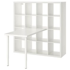 a white bookcase with several shelves on each side and one shelf at the top