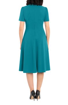 This dainty short sleeve dress is a retro inspired staple that's perfect for any well-dressed occasion. 45" length Necktie Short sleeves Back zip closure Lined 96% polyester, 4% spandex Hand wash, dry flat Imported Model Stats: 5'10" height; 34" bust; 27" waist; 35" hips. Fitted A-line Short Sleeve Dress For Spring, Classic Short Sleeve Party Dress, Fitted Short Sleeve Midi Dress For Formal Occasions, Fitted Short Sleeve Midi Dress For Formal Events, Fitted Midi Dress With Short Sleeves For Formal Occasions, Cap Sleeve Dress With Flattering Silhouette For Work, Elegant Short Sleeve Midi Dress With Back Zipper, Classic Fitted Midi Dress With Cap Sleeves, Fitted Short Sleeve Midi Dress For Spring