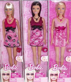 three barbie dolls are shown in the same package as they appear to be for sale