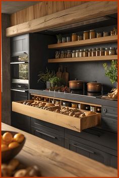 a kitchen filled with lots of food and cooking utensils on top of wooden counter tops