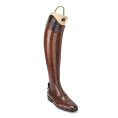 The comfort and reliability of Alberto Fasciani’s riding boots can hardly be matched and this 33202 showjumping boot is proving it once again. This is our most elegant and top-of-the-line show jumping boot in the standard collection. Made from soft natural calf leather, 33202 is made with rear zip, ornamental brogues, and an embossed logo printed on the leg. The calfskin is meticulously polished and dyed by hand - as per Alberto Fasciani’s style and heritage. Inner part in rubberized and elastic Beatriz Ball, Horse Bridle, Horse Treats, Bridles, Boot Jewelry, Dress Boots, Show Jumping, Soft Natural, Sport Bag