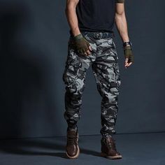 Hop on the utility fashion trend with our tactical cargo joggers for men. Perfect for both casual and sportswear, this attractive pair of men’s cargo pants is bound to add style to your whole look. Work out at the gym or go for a jog with maximum comfort. Try a pair now! ✅ Incorporating an exquisite cotton make, these tactical joggers for men are the epitome of utilitarian-inspired clothing. . ✅ Owing to their superior moisture-wicking properties, these pants will keep you dry and fresh all day Shoes For Cargo Pants, Army Trousers, Camouflage Clothing, Casual Khaki Pants, Casual Pants Men, Cargo Pants Style, Style Anglais, Tactical Cargo Pants, Best Pants