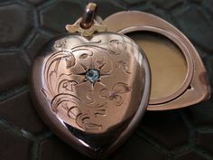 "WE SELL THIS NICE vintage antique locket photo pendant heart shape made in pinkish 9k gold decorated with genuine rose cut diamond, IN VERY GOOD CONDITION ,HAS SOME SIGNS OF WEAR COMMENSURATE WITH AGE AND USE , PLEASE SEE PICTURES, BEAUTIFUL ANTIQUE PIECE, the measures are 1 1/8\" X 7/8\" / weight 6.6gr As is a vintage antique item , it's unique , for that if you like to wear it , don't miss the opportunity, we gladly offer MICRO-PAYMENTS upon request, email me with your payment plan. OUR POLIC Heirloom Rose Gold Locket Necklace For Wedding, Victorian Engraved Rose Gold Locket Necklace, Antique Rose Gold Heart Jewelry, Vintage Rose Gold Locket Necklace For Wedding, Antique Rose Gold Jewelry With Charms, Antique Charms Locket Necklace For Wedding, Victorian Rose Gold Locket Necklace, Victorian Locket Necklace For Valentine's Day, Rose Gold Vintage Charm Locket Necklace For Wedding