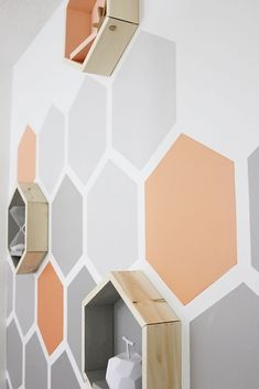 the wall is decorated with hexagonal shapes