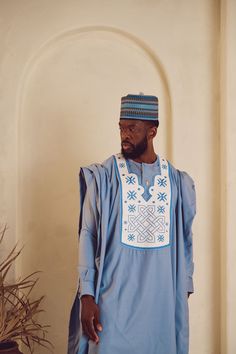 Traditional Trims - Sky Blue Premium 3 Piece Agbada Set - Long Sleeve Size: Please order the Kaftan according to our Traditional Trims sizing guide or bespoke measurements. Material: Kaftans are crafted from high-quality premium wool. Color Selection: Explore our range of available colors, providing you with a diverse color selection to choose from to suit your preferences and style. Functionality: This Kaftan set is versatile, making it ideal for various events or celebrations such as weddings, business meetings, dates, parties, engagement shoots, birthdays & etc. It's also perfect for casual everyday wear. Care Instructions: Preferably dry clean or wash in cold water. Please avoid using bleach. Imported: All outfits are handcrafted with detail and imported from Nigeria. Delivery: Please Blue Agbada With Traditional Patterns For Ceremonies, Blue Agbada For Traditional Ceremonies, Blue Traditional Agbada For Ceremonies, Traditional Blue Agbada With Traditional Patterns, Traditional Blue Agbada For Ceremonies, Blue Long Sleeve Agbada For Eid, Fitted Blue Agbada For Traditional Ceremonies, Blue Traditional Wear With Long Sleeves And Traditional Patterns, Fitted Blue Kurta With Traditional Patterns