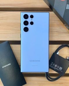 the new samsung note 9 is on display next to its charger and power bank