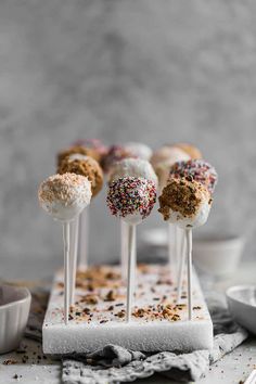 cake pops with sprinkles and chocolate on top