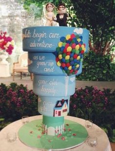 there is a cake that has balloons on it