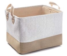 a white and brown basket with handles on the bottom is sitting in front of a white background