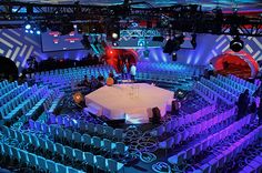 the inside of a large auditorium with chairs and tables in it that says, inspirational design ideas for your general session